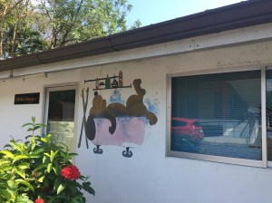 Wall art of dog in bath at Soi Dog Foundation Phuket