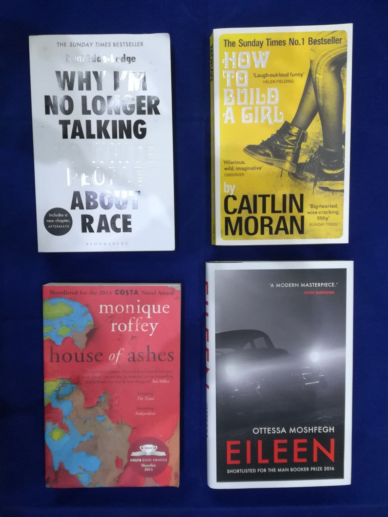 Copies of 'Why I'm No Longer Talking to White People About Race' by Remi Eddo-Lodge, 'How to Build a Girl' by Caitlin Moran, 'House of Ashes' by Monique Roffey and 'Eileen' by Ottessa Moshfegh