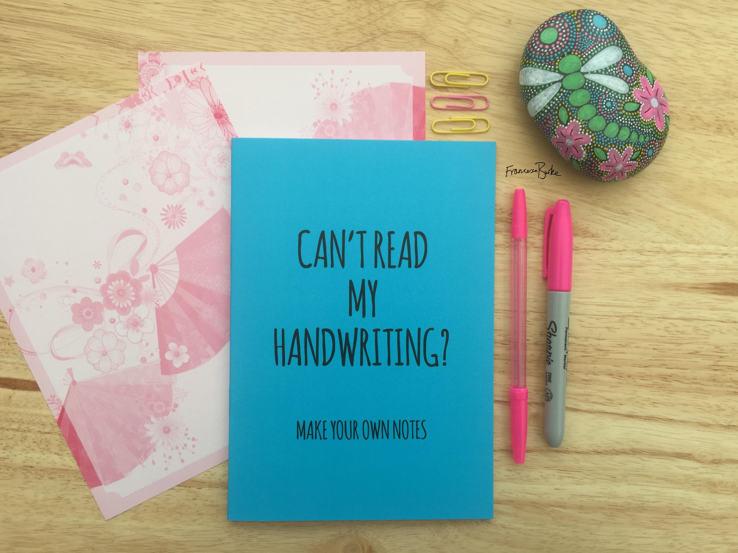 blue notebook with words 'can't read my handwriting? Make your own notes'