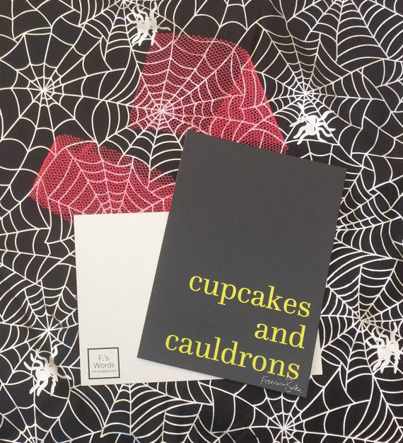 yellow on black print reading 'cupcakes and cauldrons'