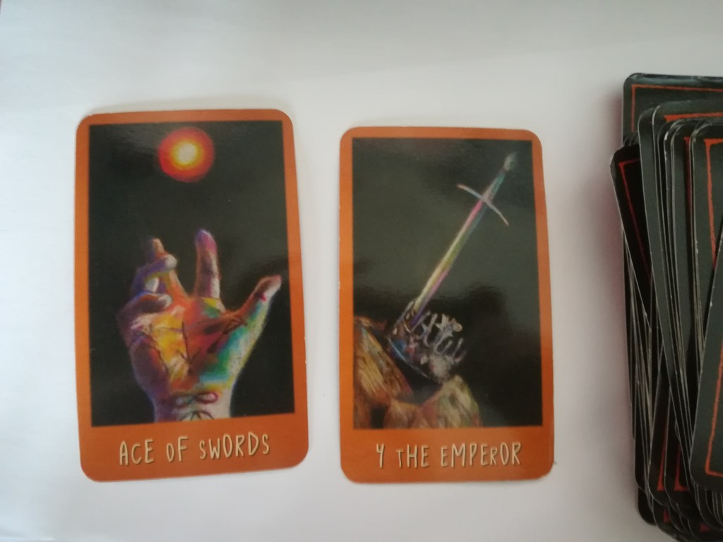 image of the Raven's Prophecy tarot, showing the Ace of Swords and the Emperor