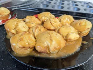 plate of cakes with a lot of pooled glaze
